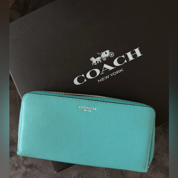 Coach Handbags - Coach Turquoise Zip-Around Leather Wallet with Gold Accent